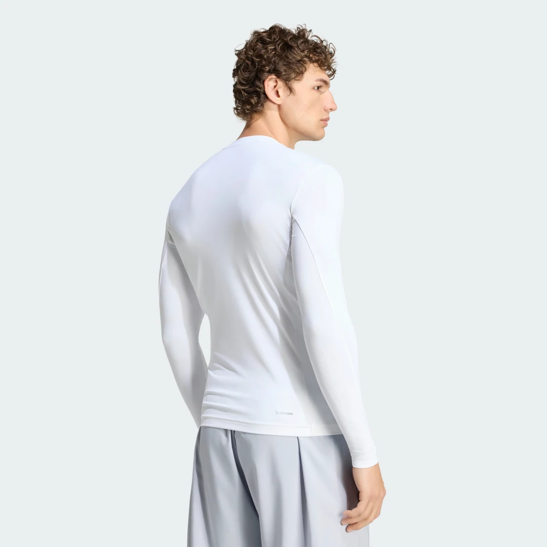Detalle 2 de Camiseta de manga larga de entrenamiento PrimeLift Essentials de Adidas