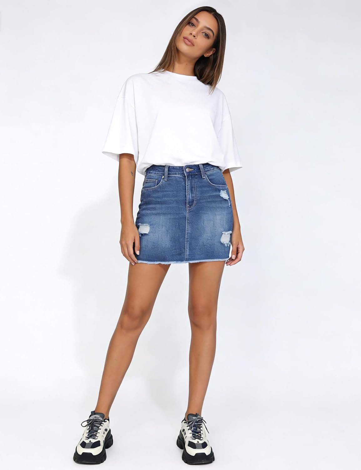 Detalle de THE GYM PEOPLE Women's Ripped Denim Mini Skirt, Stretch Denim, Raw Hem