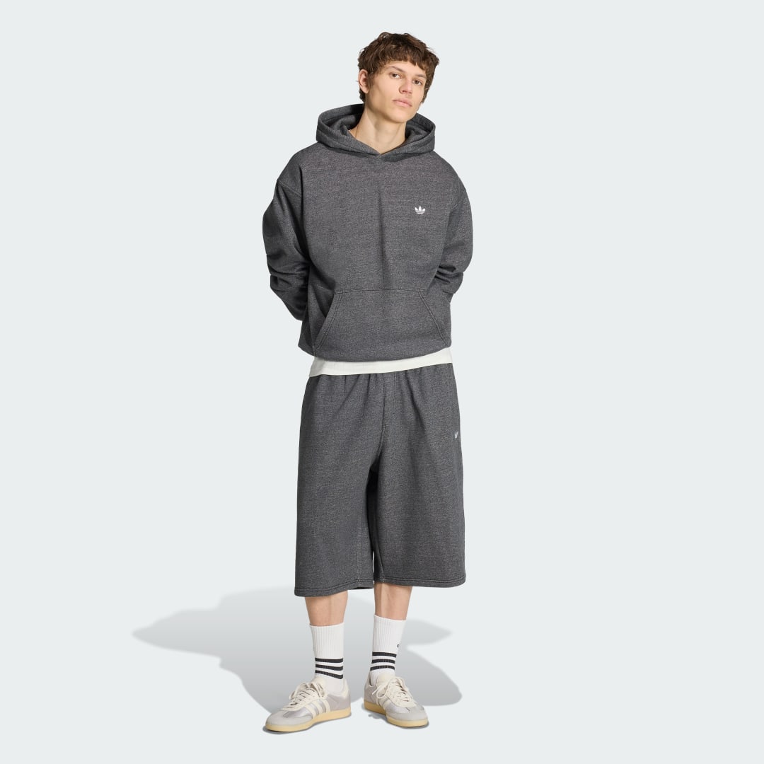 Detalle de Sudadera con capucha Trefoil Essentials jaspeada de corte holgado — Adidas