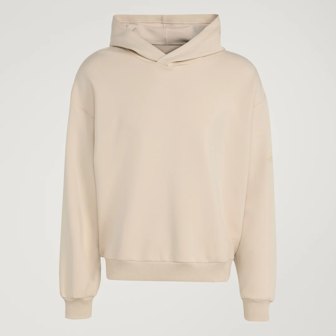 Detalle 2 de SUDADERA CON CAPUCHA SOFT LUX de Adidas: comodidad suave y estilo minimalista en beige