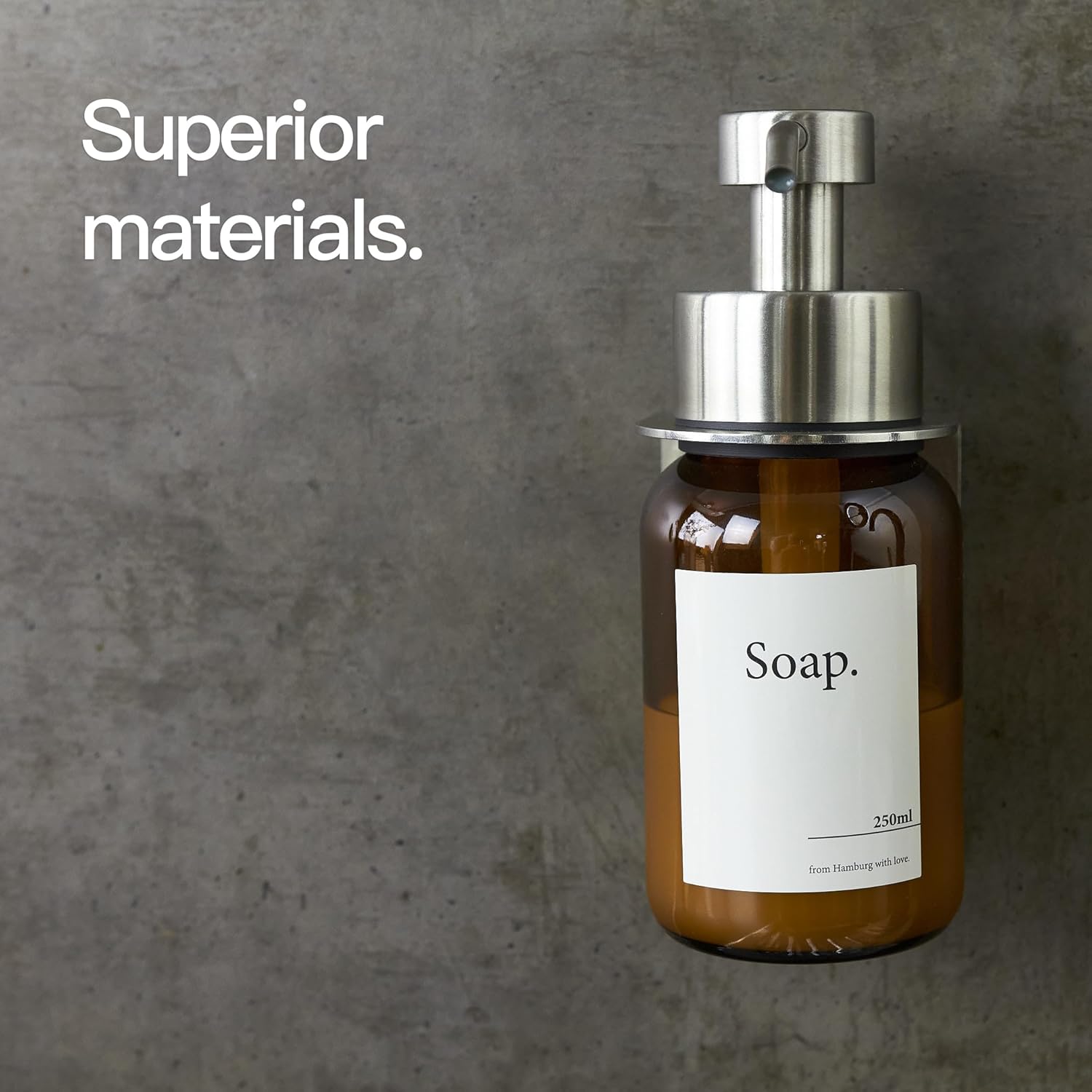 Detalle de Designfactory Hamburg Glass Soap Dispenser | Wall-Mounted, Durable Glass & Stainless Steel