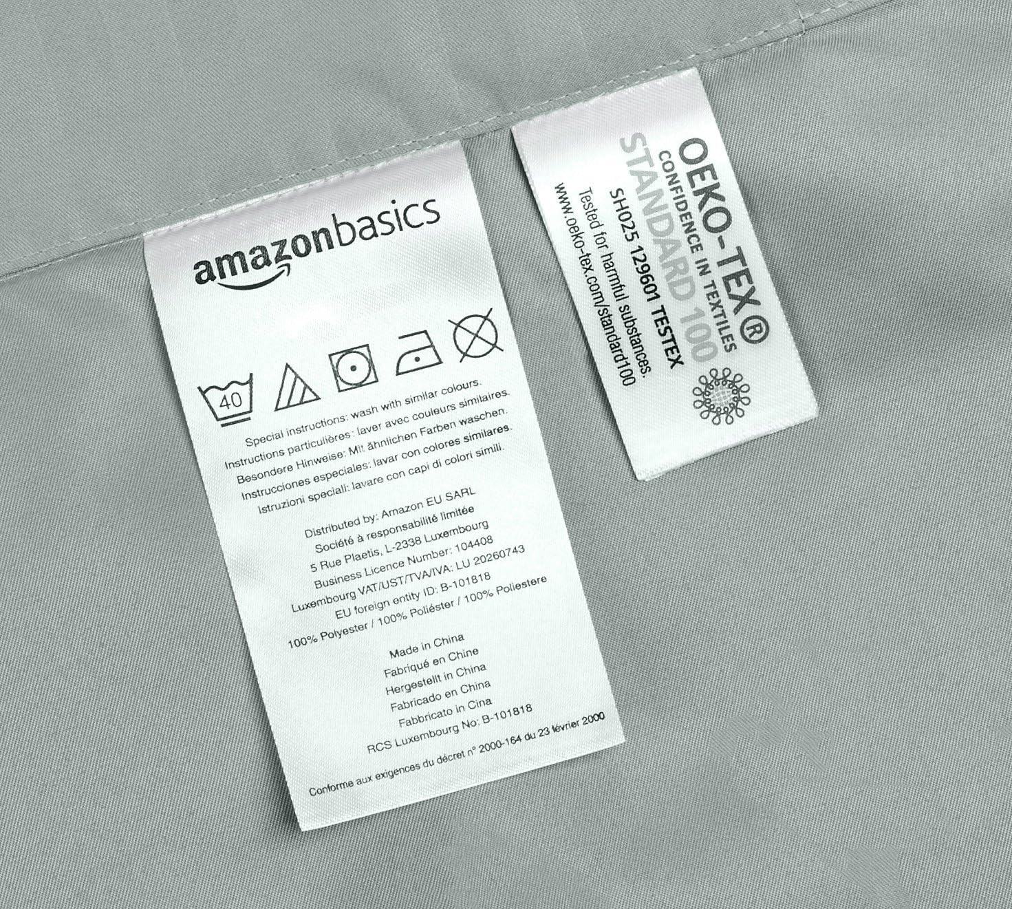 Detalle de Amazon Basics Microfibre Bedding Duvet Cover Set (135 x 200 cm) with 80 x 80 cm Pillowcase in Dark Grey