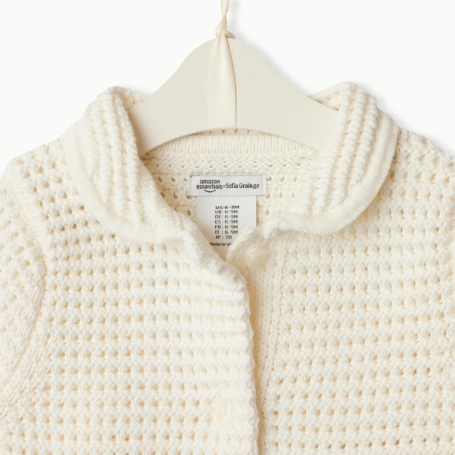 Detalle de Amazon Essentials x Sofia Grainge Maglione in cotone con colletto Peter Pan per Bimba 0–24 mesi