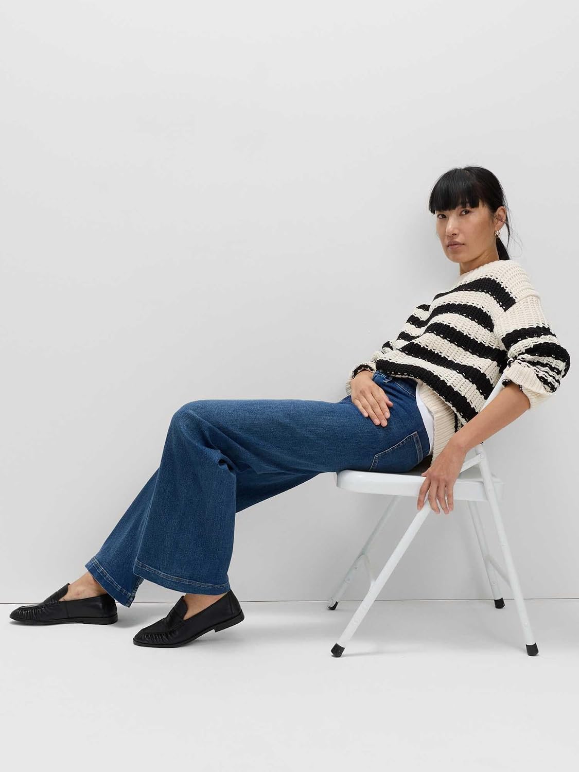 Detalle de Marks & Spencer damesjeans met hoge taille, wijde pijpen en stretch