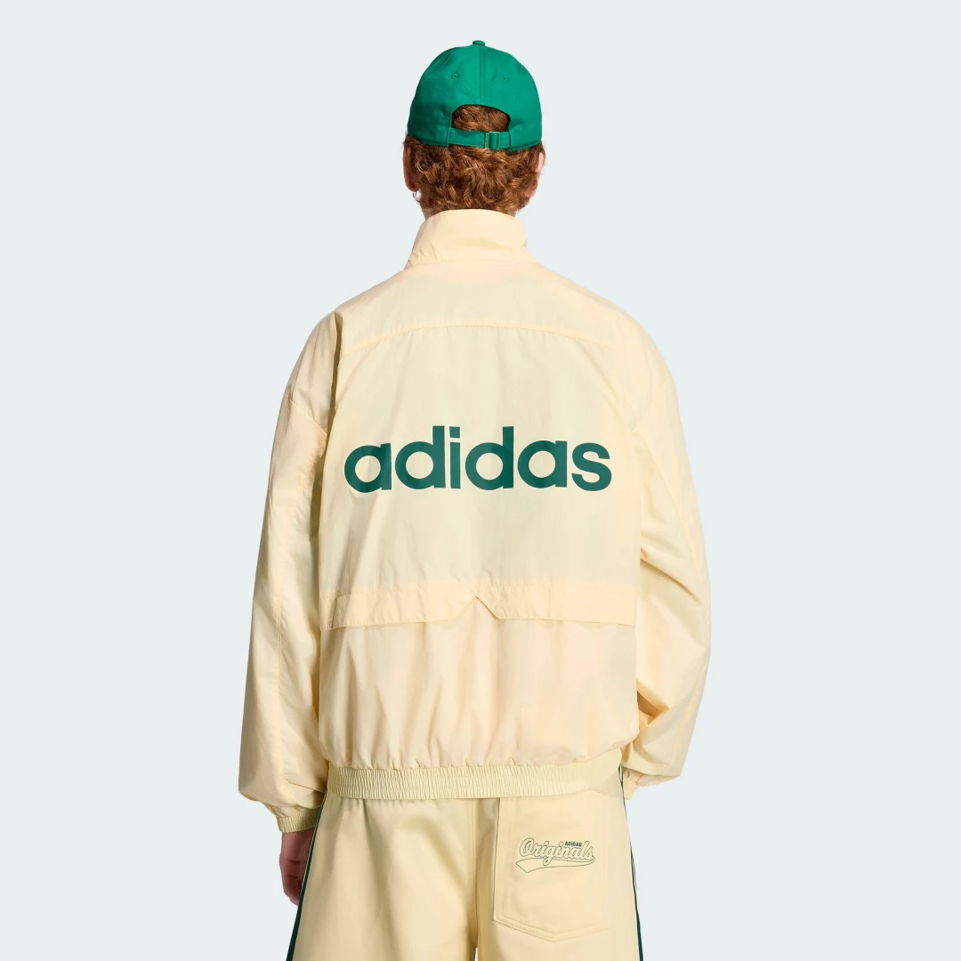 Detalle de Sudadera Munich 93 de Adidas – Amarillo