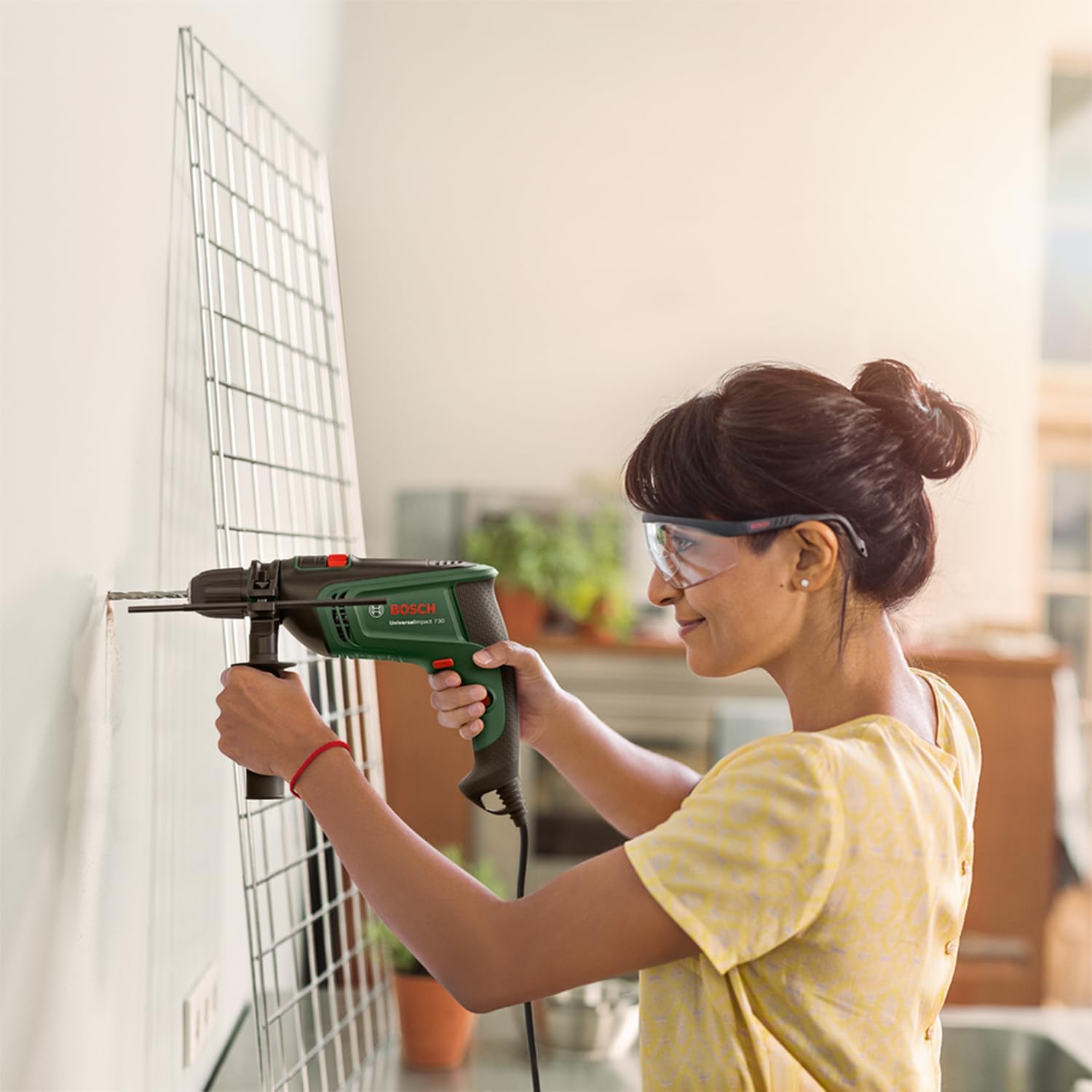 Thumbnail 2 de Bosch Home and Garden UniversalImpact 730 : perceuse à percussion pour vos travaux du quotidien