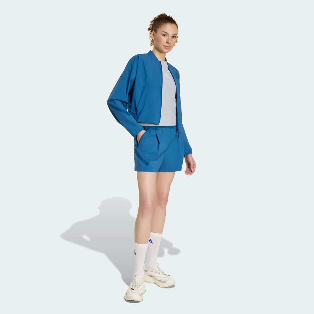 Detalle de Pantalón corto tejido técnico adidas Z.N.E. – azul