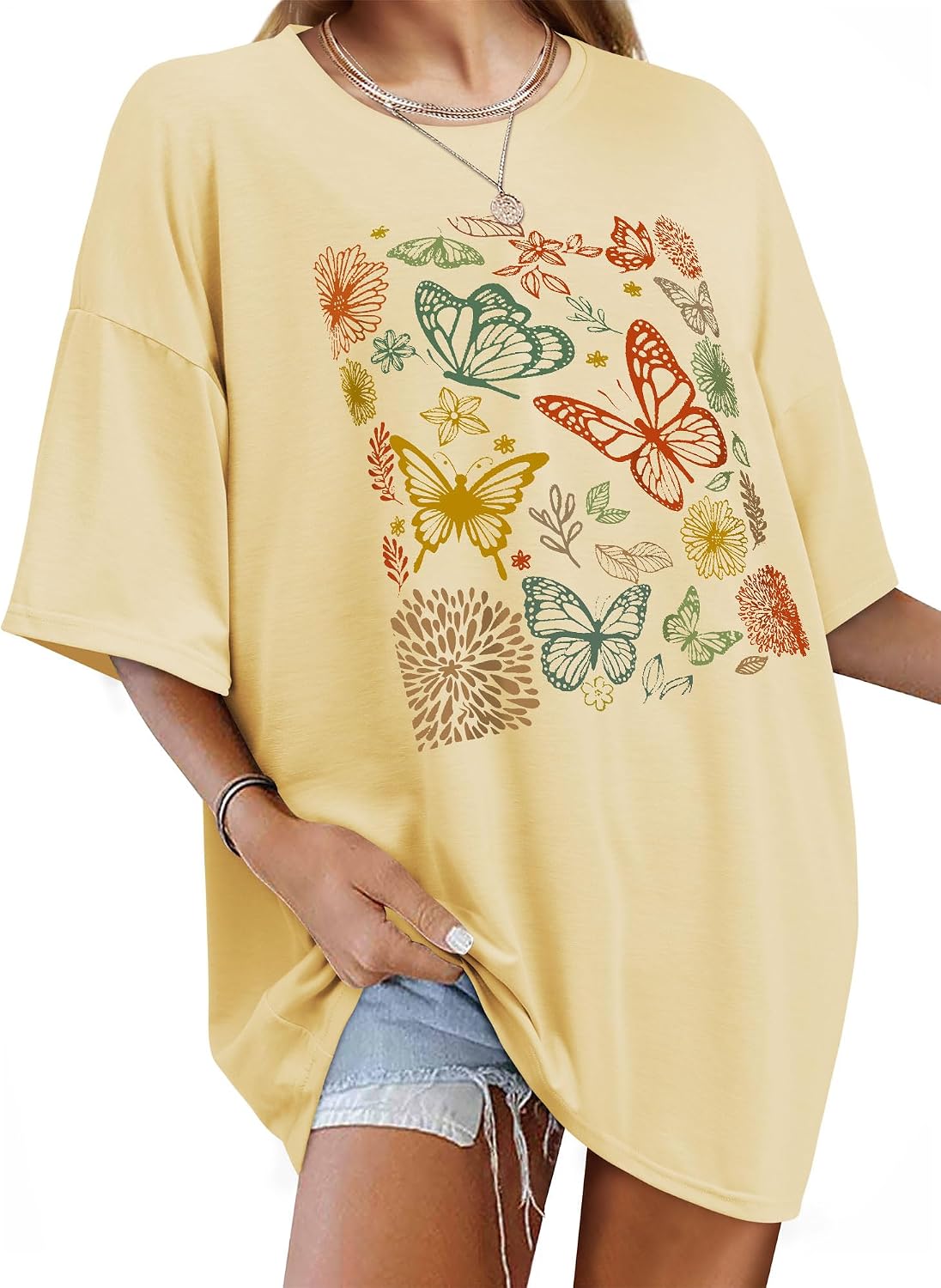 Detalle de WIEIYM Women Oversized T Shirt with Butterfly Flower Graphic – Boho Summer Boost