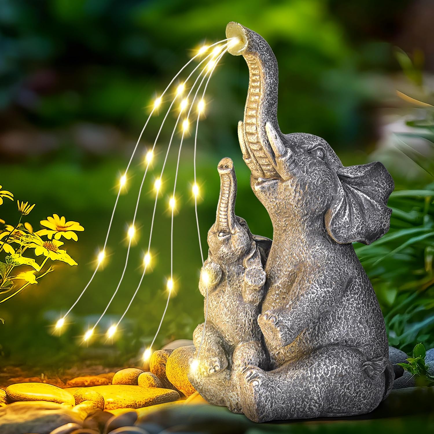 Detalle de GIGALUMI Solar Garden Statues Embrace Elephant figurine with solar lights for outdoor patio and yard decor