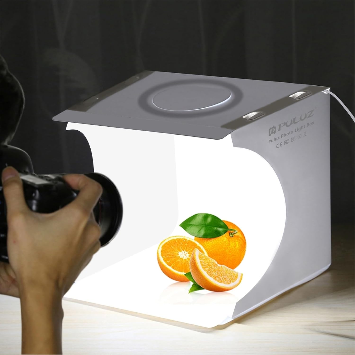 Detalle de PULUZ Mini-Fotostudio mit 72 LED-Leuchten, 6 farbigen Hintergründen und dimmbarer Lichtsteuerung
