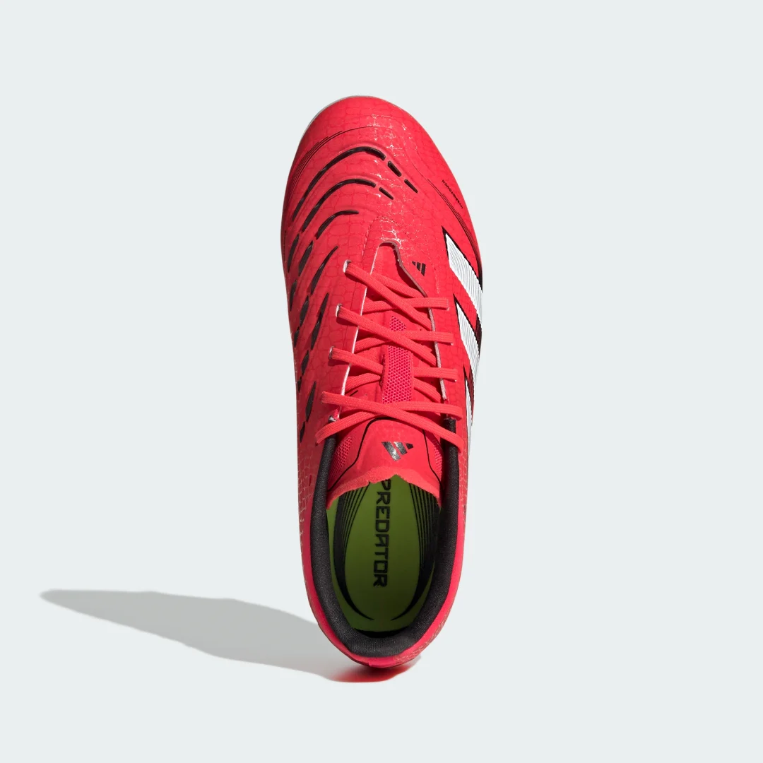 Detalle de Adidas Predator Elite, bota de fútbol roja para adolescentes y césped natural seco