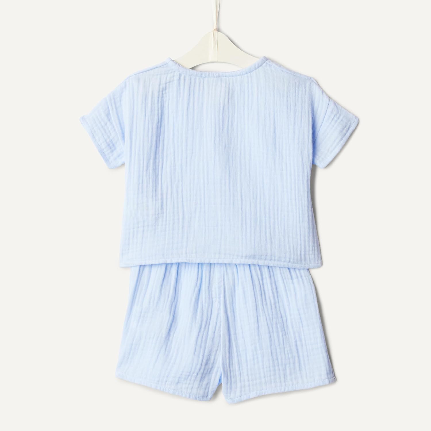 Detalle de Amazon Essentials x Sofia Grainge Unisex Baby Spielset aus Baumwollgaze: Hemd und Shorts