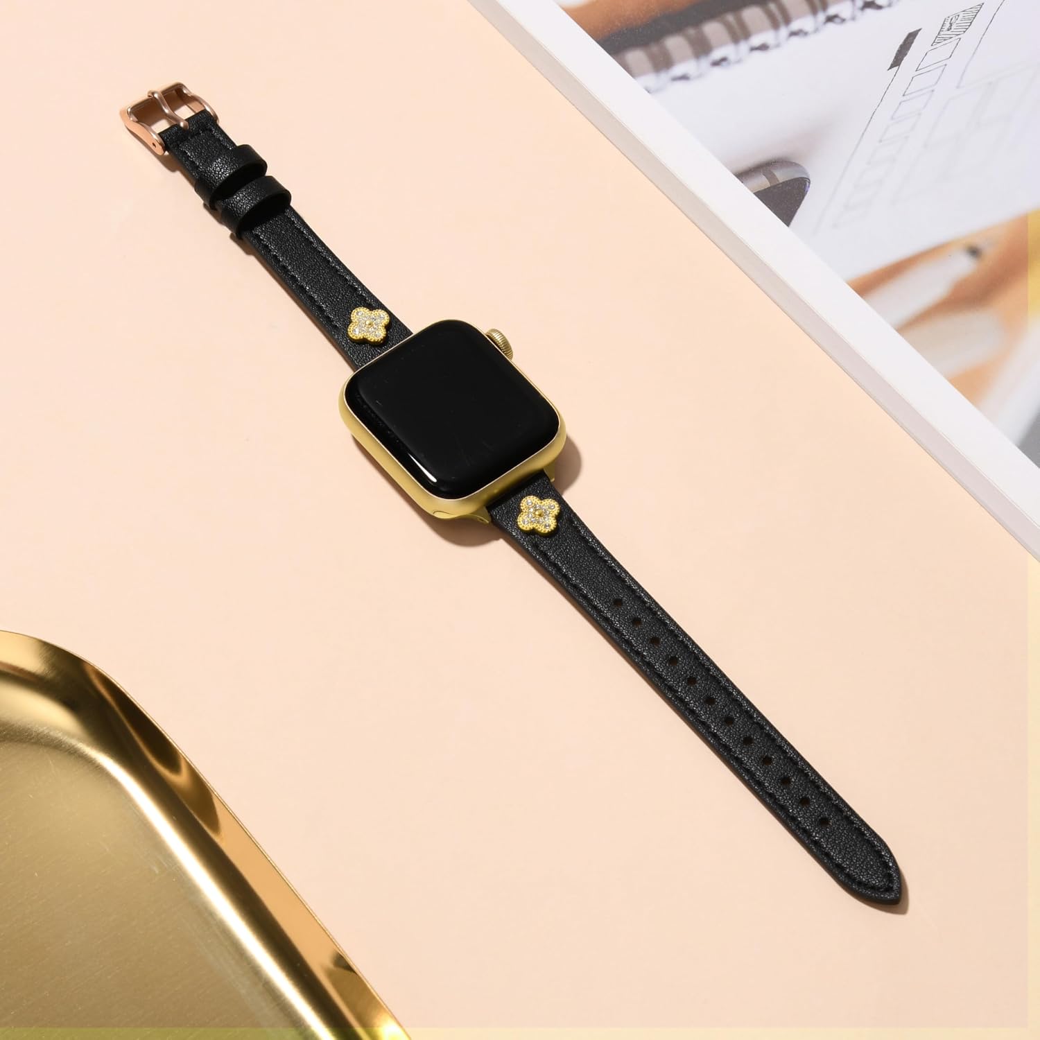 Detalle 2 de STIROLL Slim Leather Apple Watch Band with Clover Charms, Black and Rose Gold