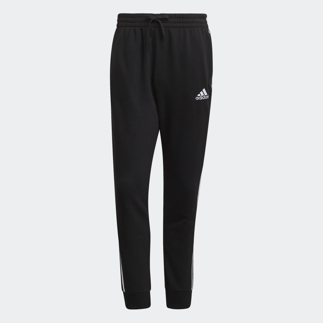 Detalle de Pantalón Essentials French Terry Tapered Cuff 3 bandas de Adidas — negro