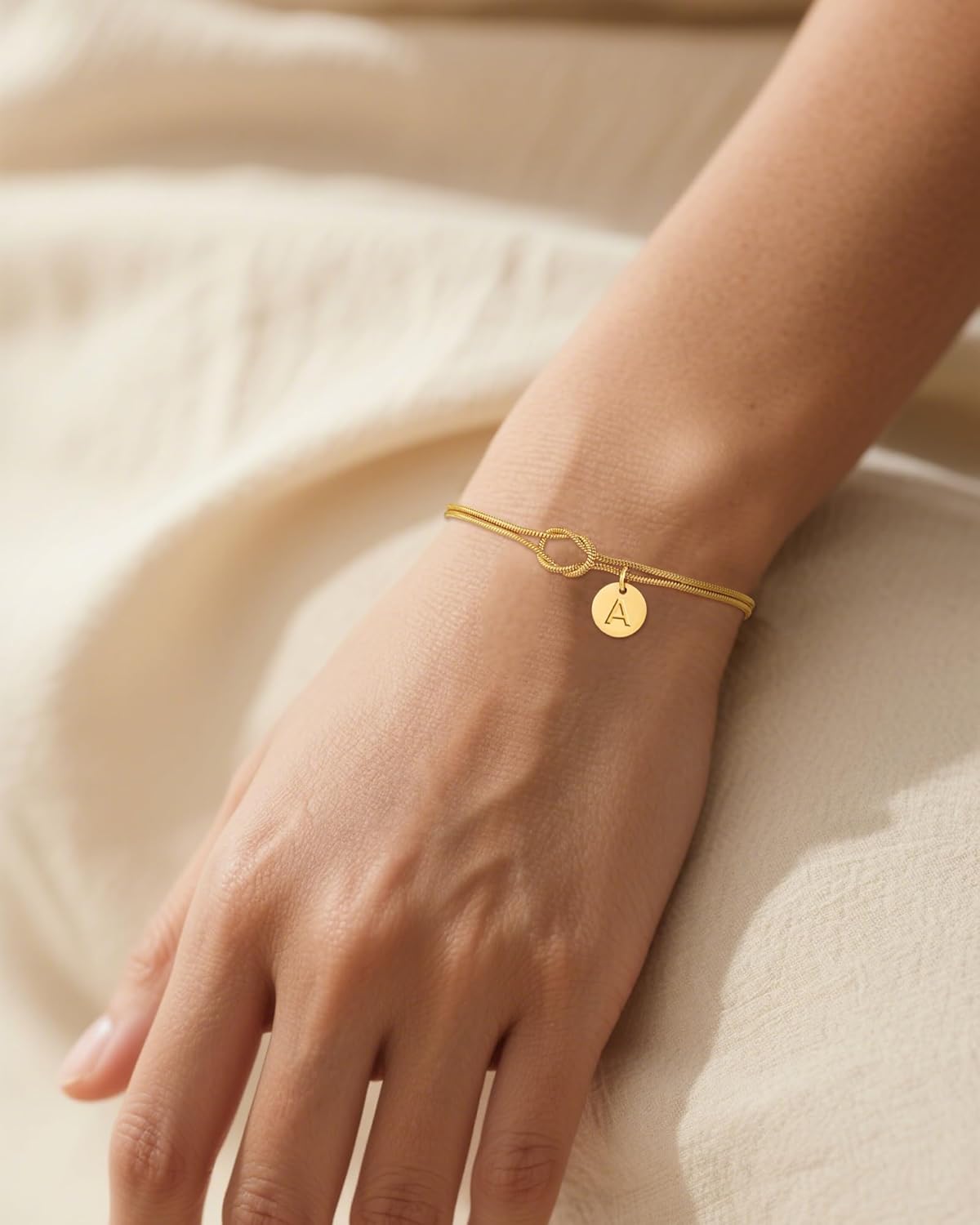 Thumbnail 1 de TOLOWOBK gold initial bracelet with infinity love knot design (18K gold plated 316L stainless steel)