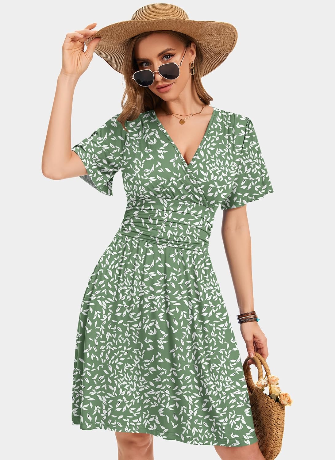 Detalle de WNEEDU Sommerkleid Damen Elegant mit V-Ausschnitt, Empire-Taille und Taschen – Luftiges Strandkleid