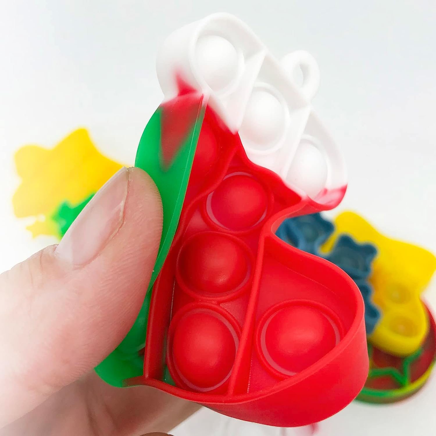 Detalle 2 de SUNOWE Christmas Mini Push Pop Fidget Keychains, 24-Piece Silicone Set