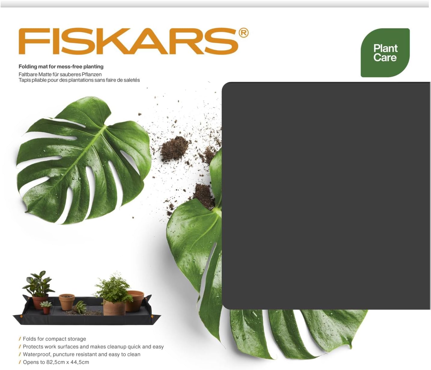 Detalle 2 de Fiskars 1071304 – składana mata do przesadzania 82,5 × 44,5 cm z podwyższanymi brzegami