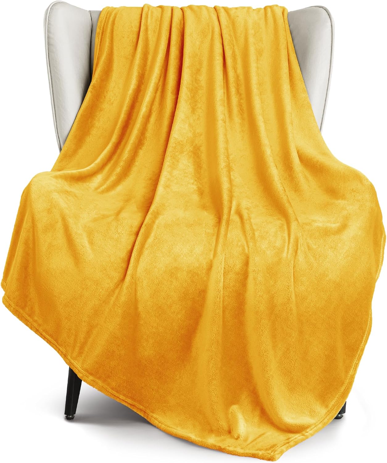 Detalle de Fleece throw blanket 127 x 178 cm in mustard