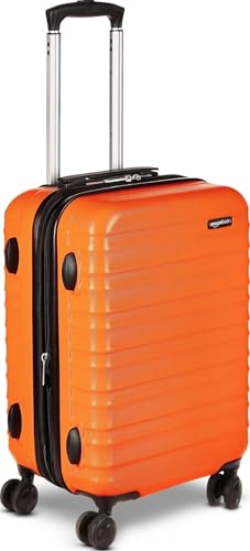 Detalle de Amazon Basics Hard Shell Small Suitcase (Burnt Orange) – 55 x 37.5 x 25.5 cm, Expandable ABS with 4 Double Spinner Wheels