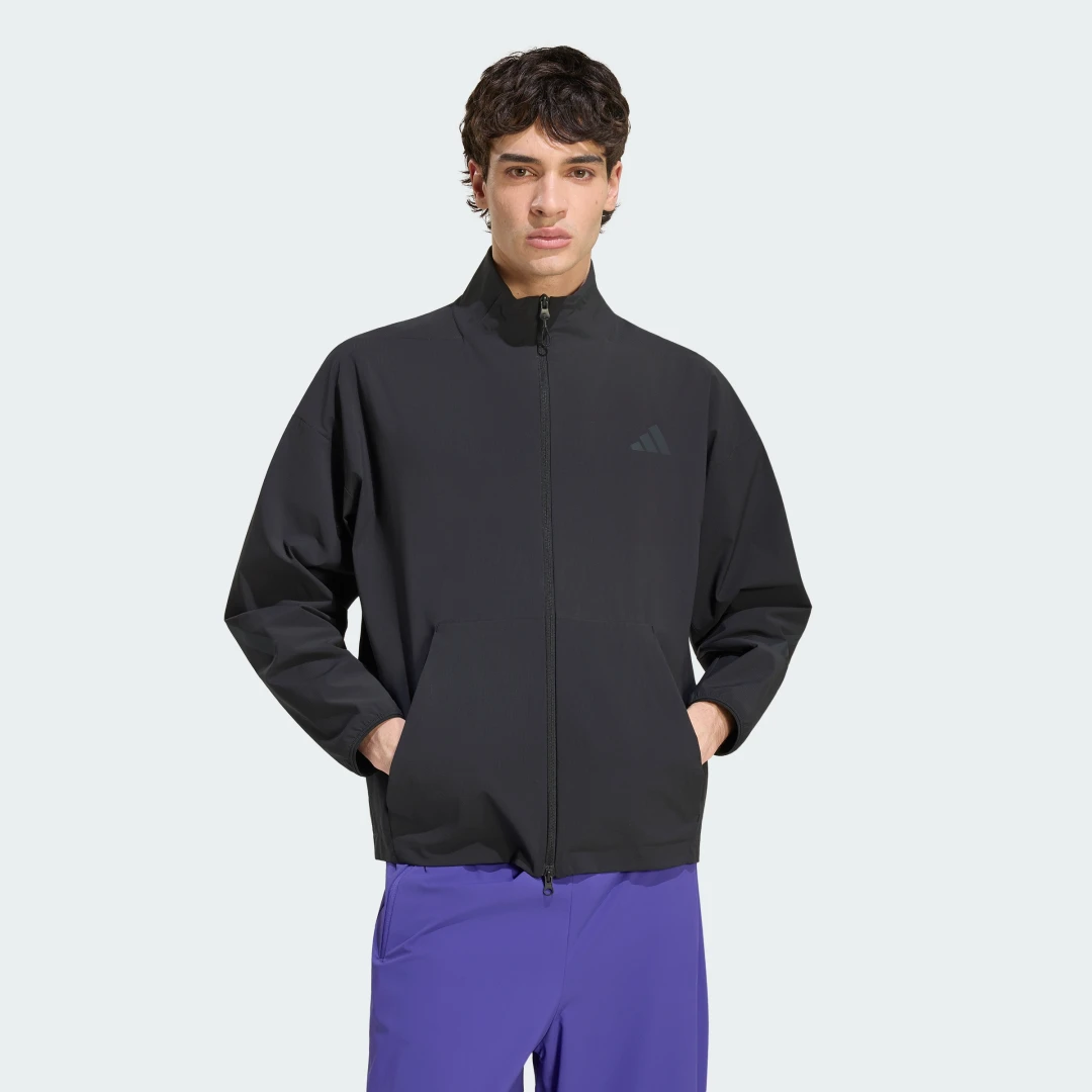 Detalle de SUDADERA ADIDAS Z.N.E. WOVEN en Negro: guía de compra