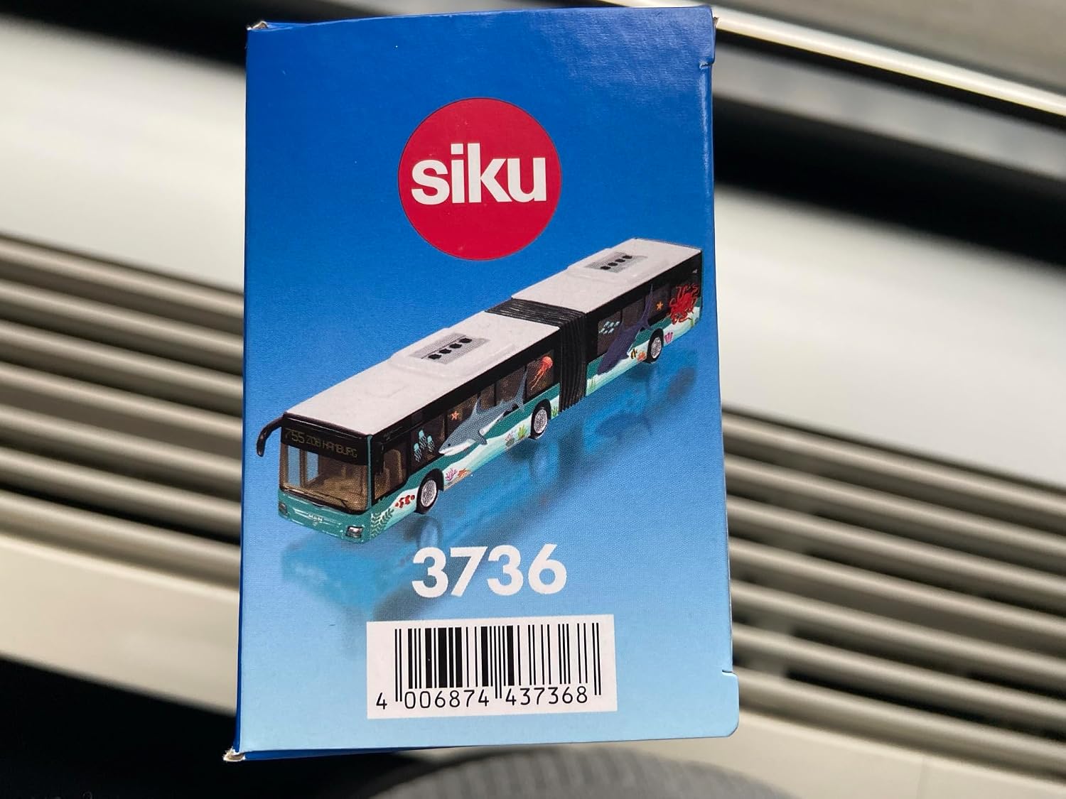 Thumbnail 5 de SIKU 3736 MAN – przegubowy autobus 1:50 z gumowymi oponami i naklejkami