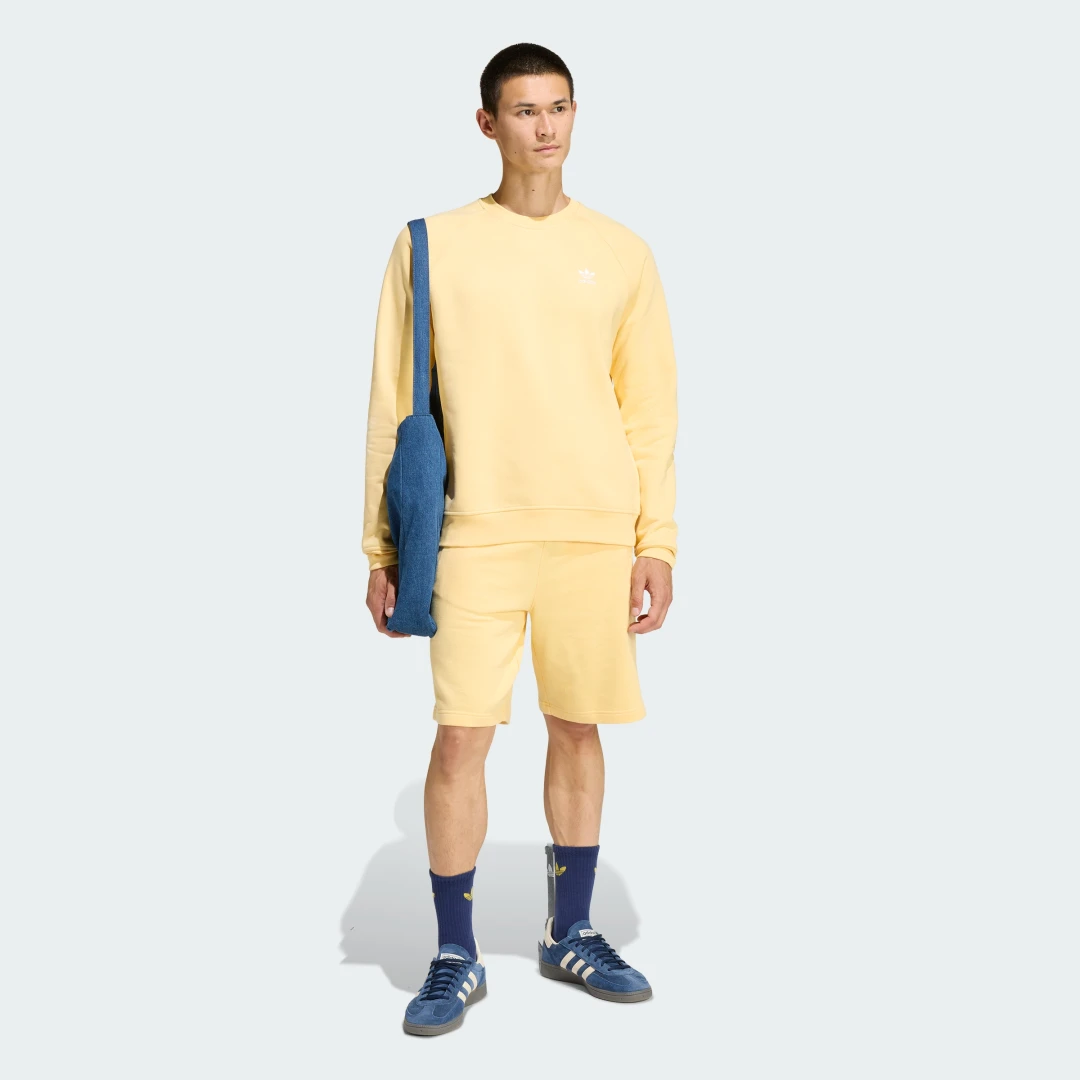 Detalle de Pantalón corto Essentials Trefoil de Adidas – naranja