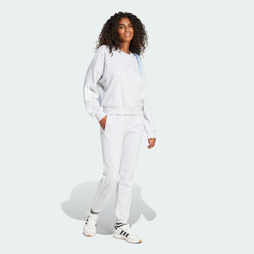 Detalle de Pantalón Essentials French Terry Cuffed 3 bandas de Adidas