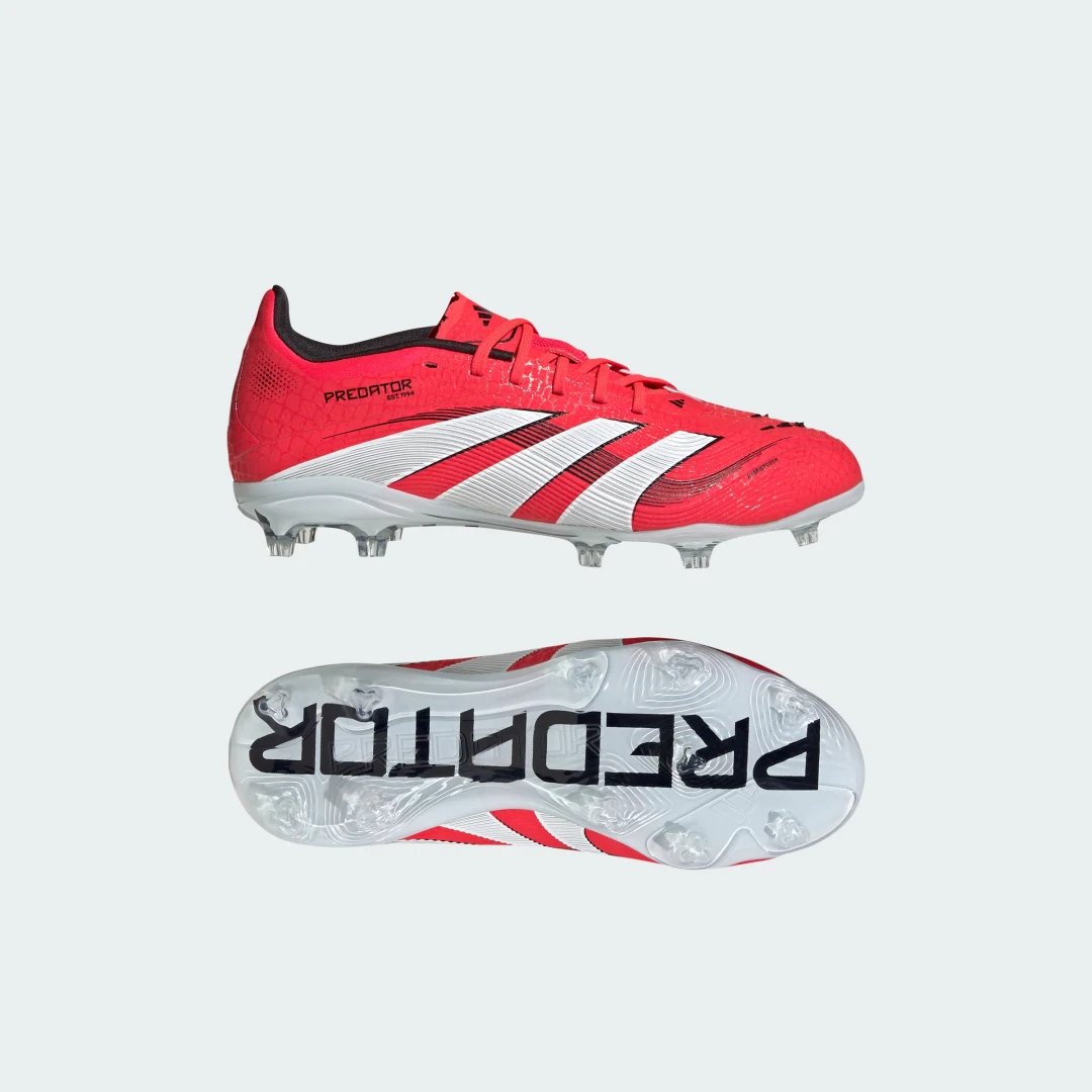 Detalle de Adidas Predator Elite, bota de fútbol roja para adolescentes y césped natural seco
