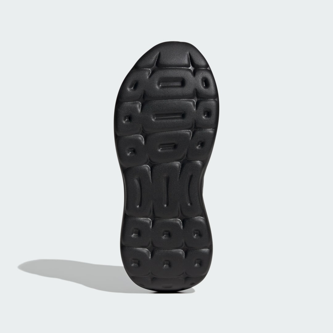 Detalle de Adidas Tensaur Run 3.0: Zapatilla negra para entrenamiento diario y uso urbano
