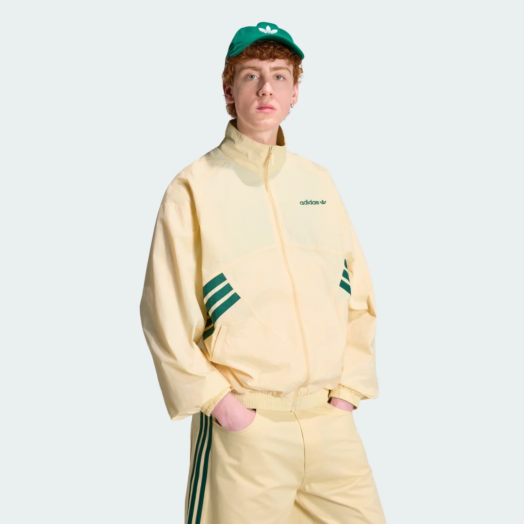 Detalle de Sudadera Munich 93 de Adidas – Amarillo