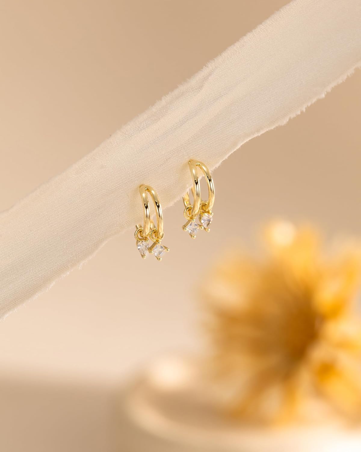 Detalle 2 de HANLI 14K Gold Plated Triple Huggie Hoops: Illusion Cubic Zirconia Studs for Single-Pierced Ears