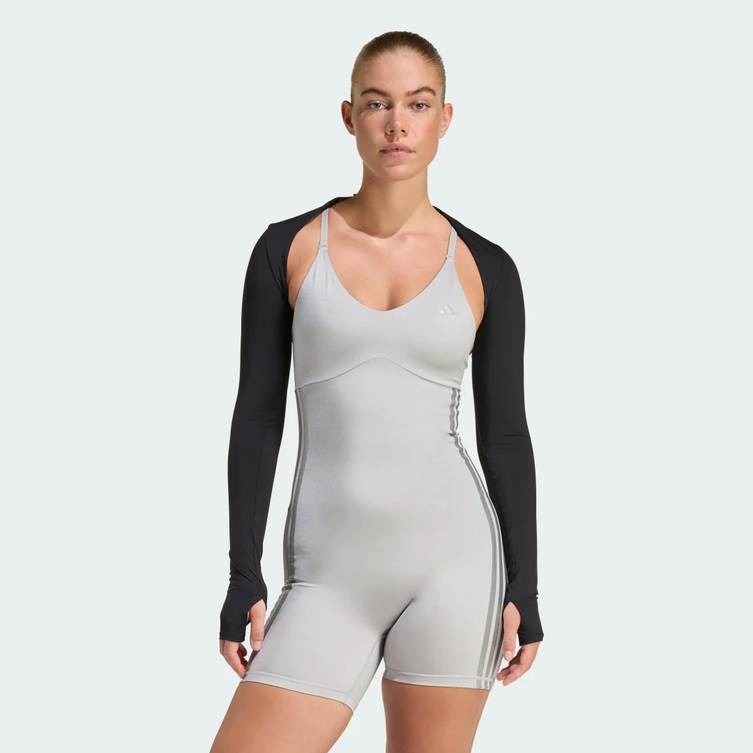 Detalle de Adidas PrimeLift Essentials, bolero de entrenamiento negro con efecto moldeador