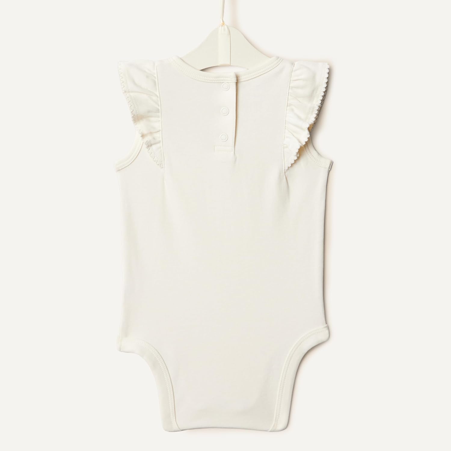 Detalle de Amazon Essentials x Sofia Grainge Body in cotone con volant e ricami - Pack da 2 per bambine e ragazze