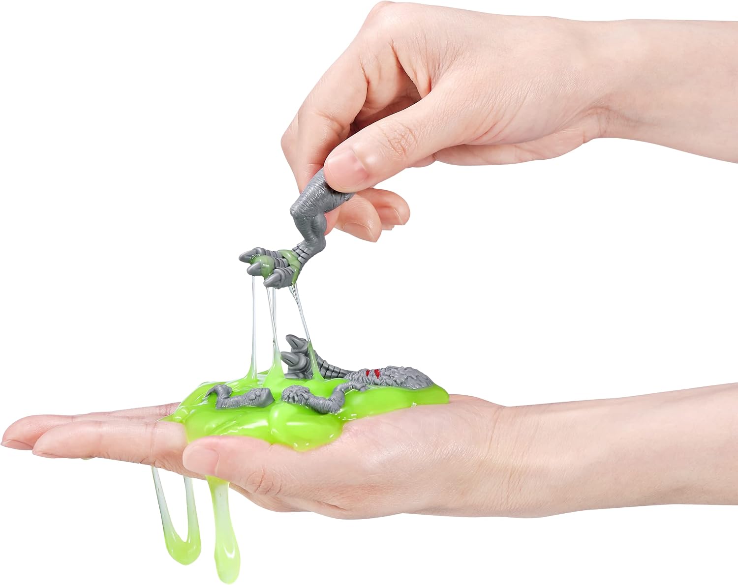 Detalle de Smashers Mini Jurassic Light-Up Dino Egg Spinosaurus Toy with Surprises