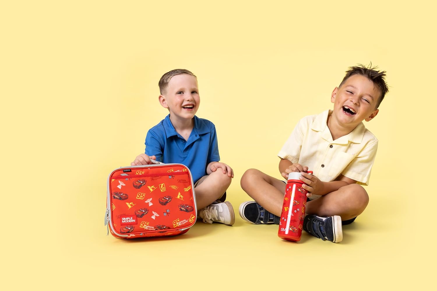 Thumbnail 1 de Simple Modern Disney Pixar Lightning McQueen Kids Water Bottle (14oz) with Straw Lid