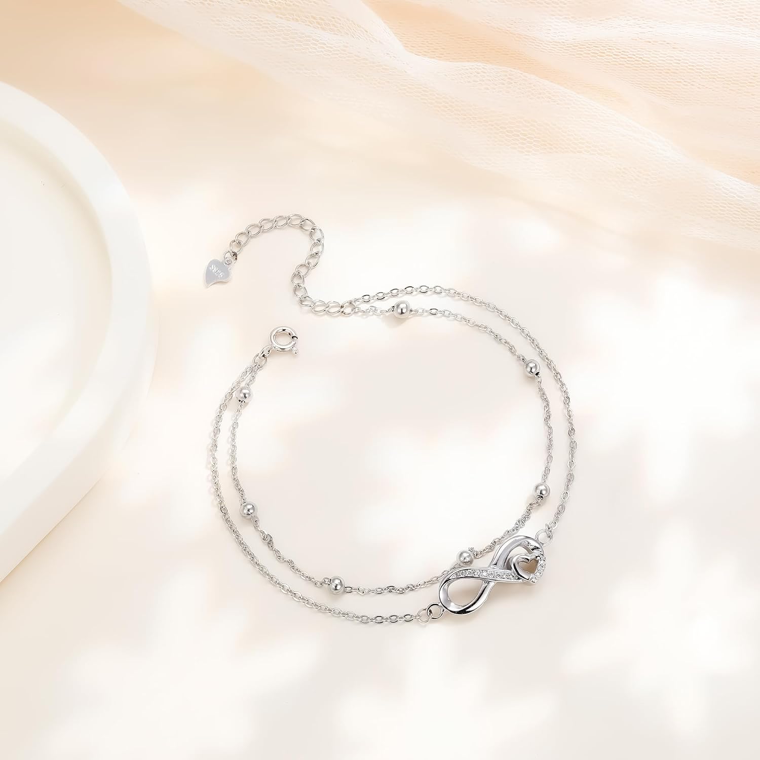Detalle 2 de J.MUEN Damen-Armband aus 925 Sterling Silber (unendliches Motiv mit Zirkonia), verstellbar für Muttertag & Geburtstag